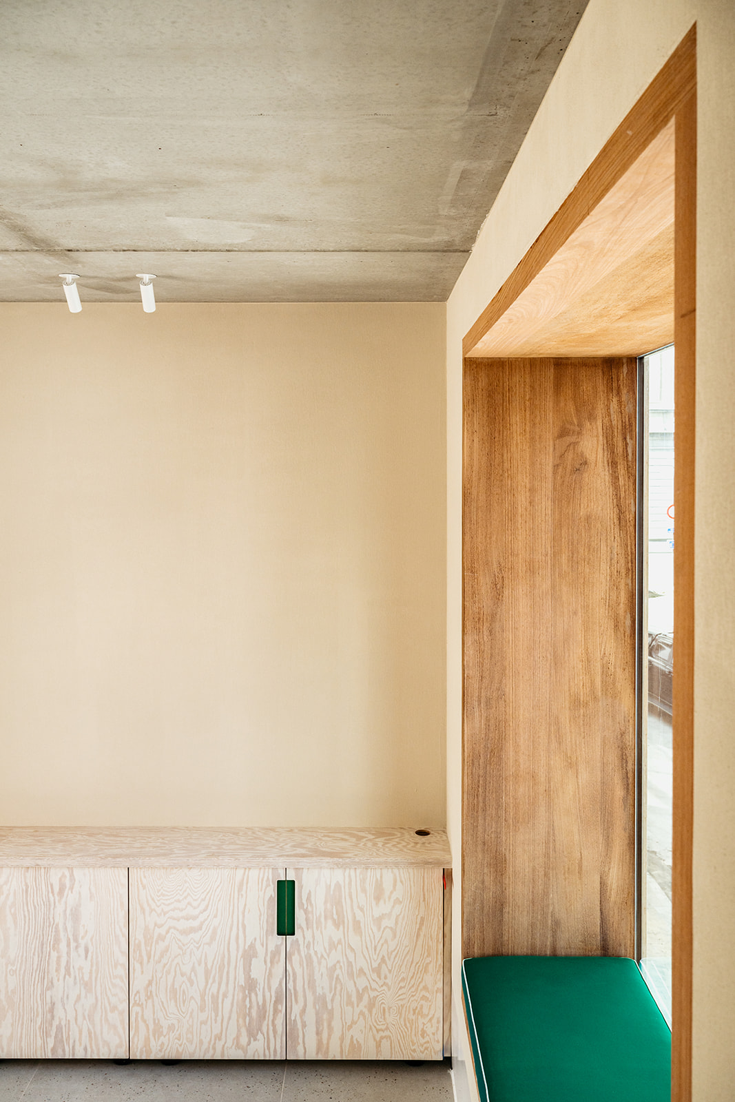 Plywood bench with green accents